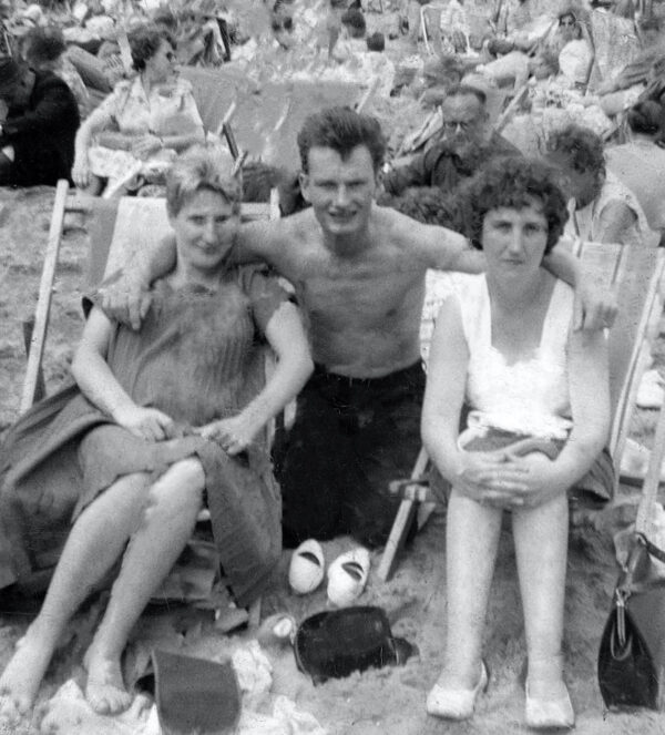 Restored black and white image of friends at the beach